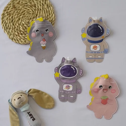 کیسه آب گرم طرح آدم فضایی و دایناسور